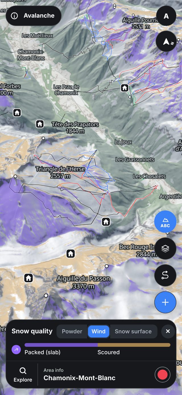 Wind slabs layer above Chamonix: lee slopes coloured where wind has packed the new snow into slabs